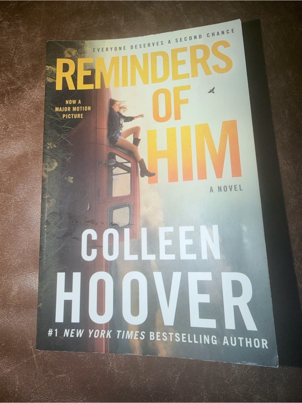 "Reminders of Him" Book - Yellow/Orange Cover